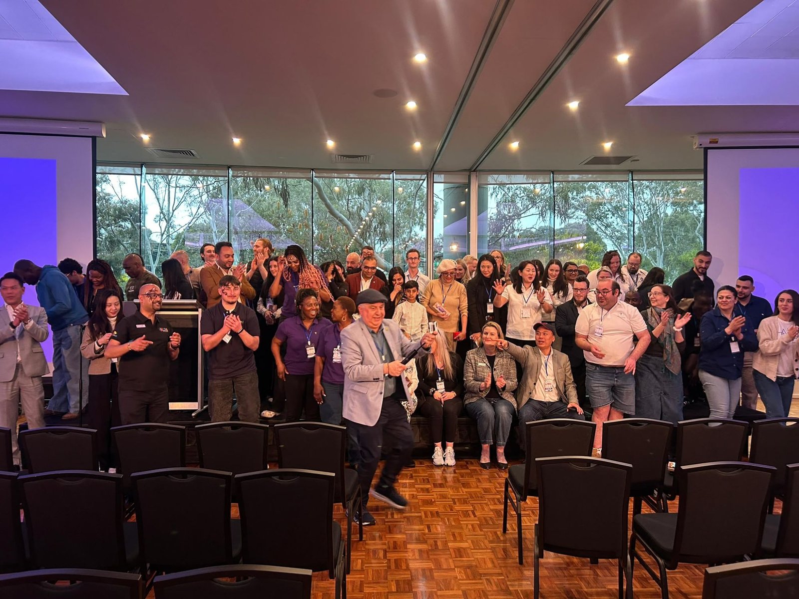 Wide shot of the expo audience celebrating during the opening ceremony